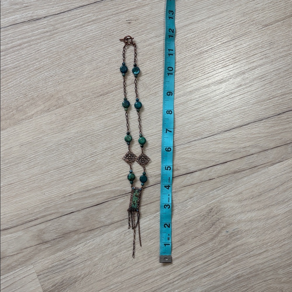 Handmade teal and copper necklace with bird pendant - Picture 2 of 5